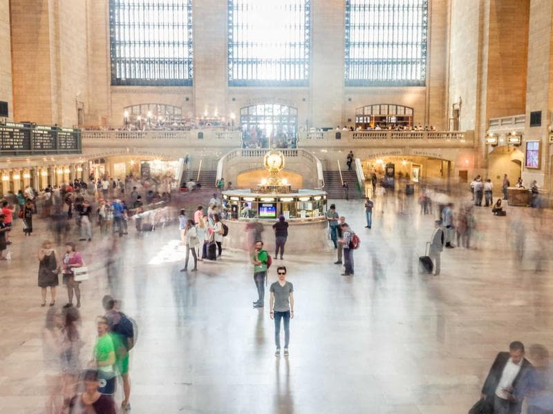 Terrace dining table set for breakfast with dhoni boats in the harbour beyond